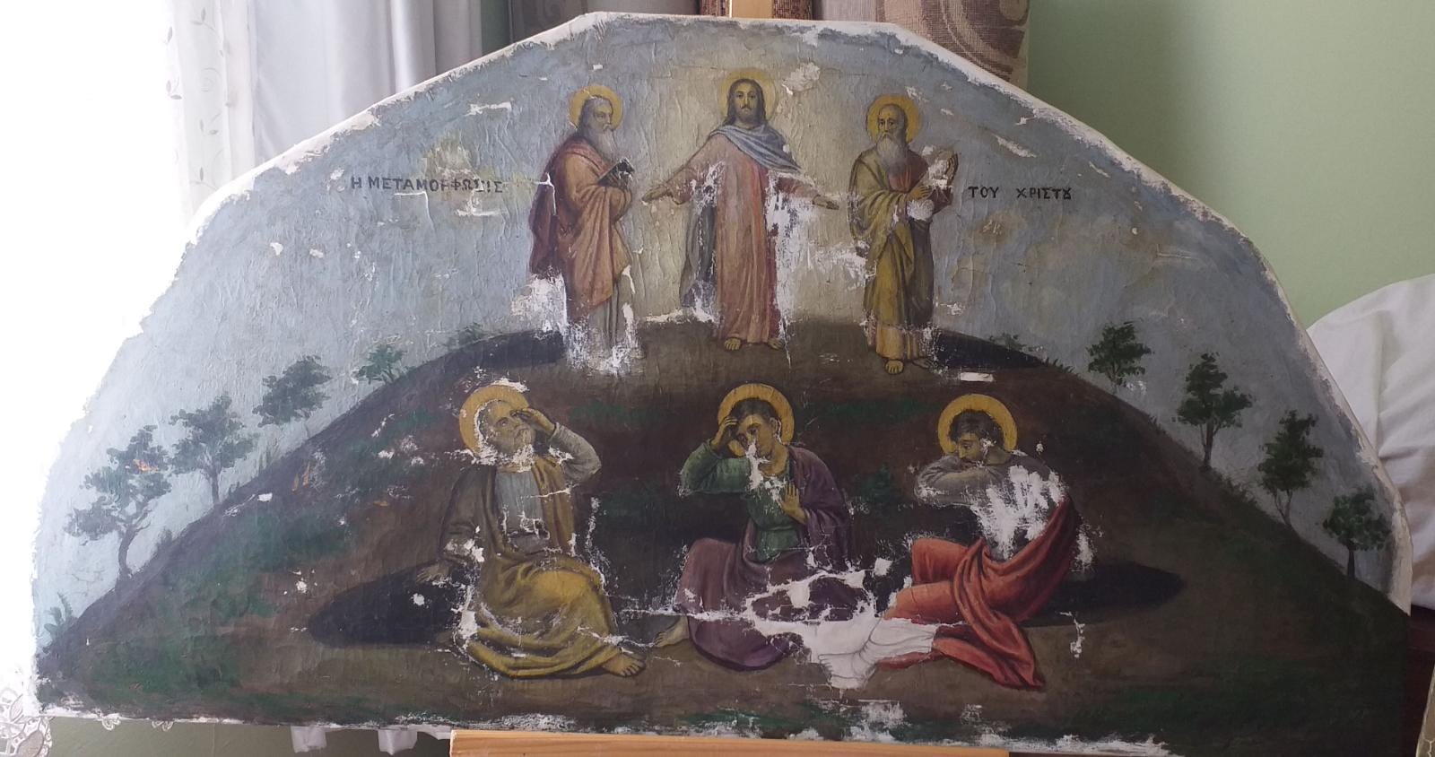 The Transfiguration canvas before treatment, with paint losses in the lower register