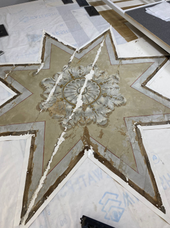 Star with losses filled in white reversible plaster